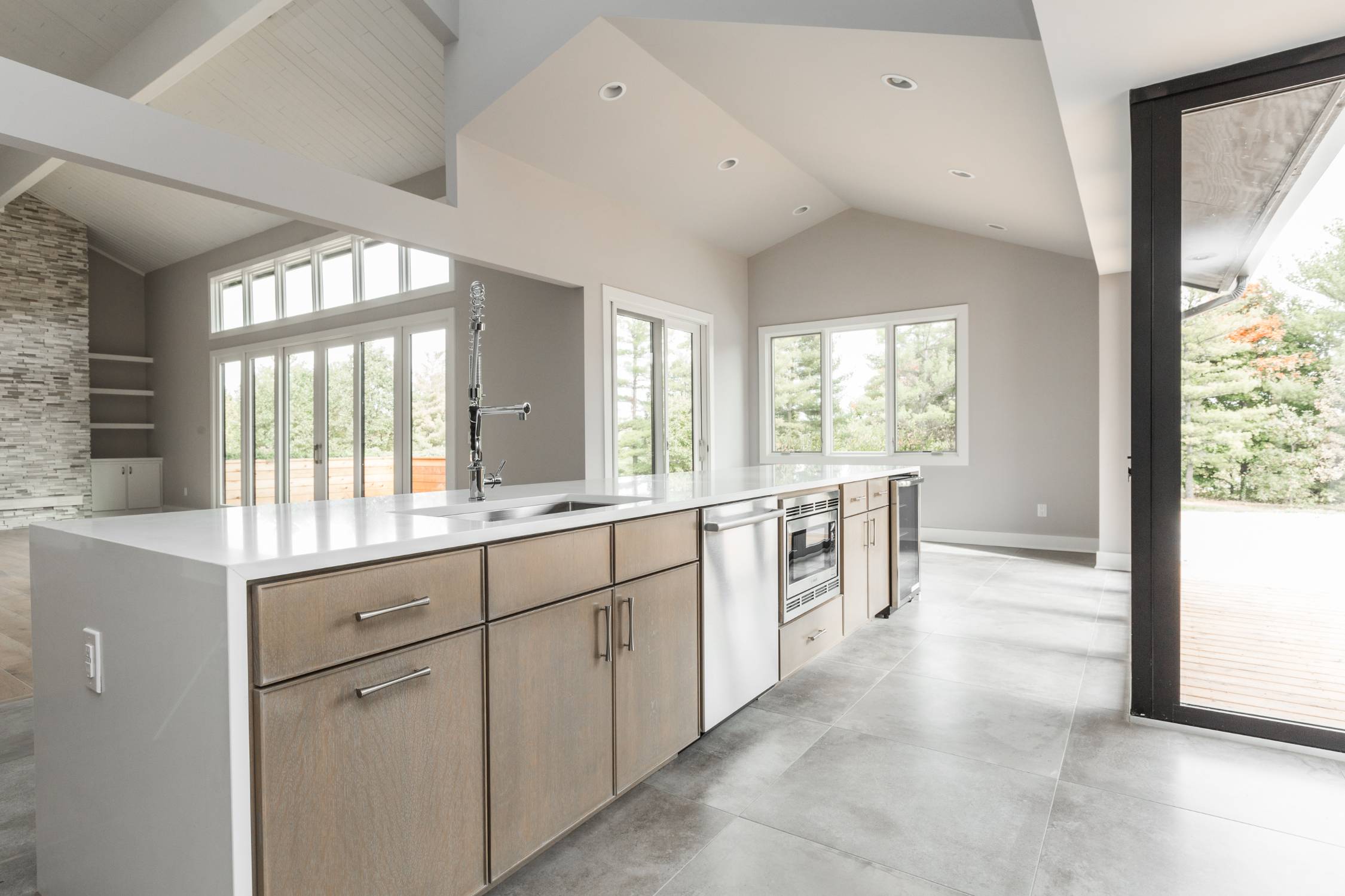 Luxury custom home with vaulted ceilings, natural light, and modern finishes by Eaton Custom Homes